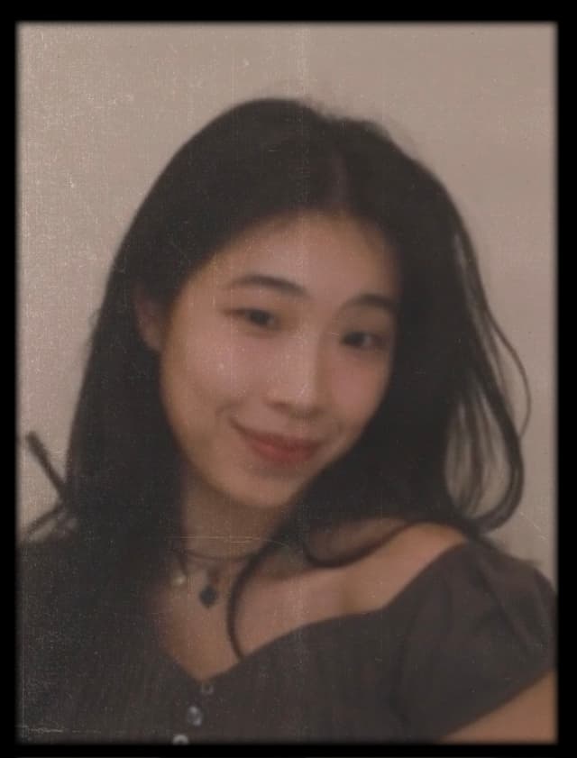 Claire Chiu, product designer and software engineer, in a vintage photo booth portrait.